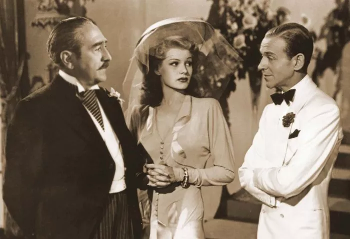 Fred Astaire (Robert Davis), Rita Hayworth (Maria Acuña), Adolphe Menjou (Eduardo Acuña) zdroj: imdb.com