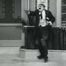 Chaplin na kolečkových bruslích (1916) - Mr. Stout