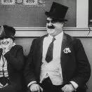 Chaplin na kolieskových korčuliach (1916) - Mr. Stout