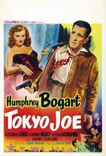 Humphrey Bogart (Joseph ’Joe’ Barrett), Florence Marly (Trina Pechinkov Landis) zdroj: imdb.com