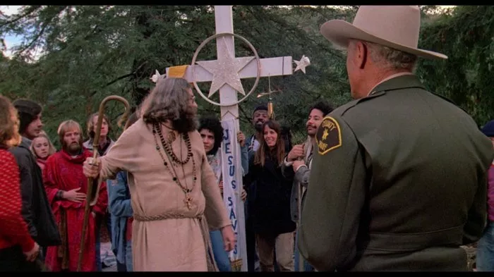 Eric Gordon (Hippy ’Jesus Freak’), Robert J. Wilke (The Sheriff) zdroj: imdb.com