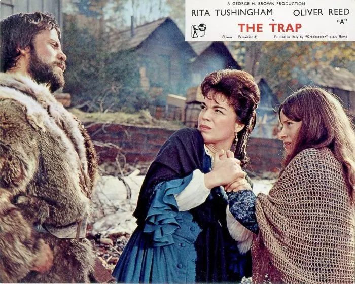 Oliver Reed (La Bete), Barbara Chilcott (Trader’s Wife), Rita Tushingham (Eve) zdroj: imdb.com