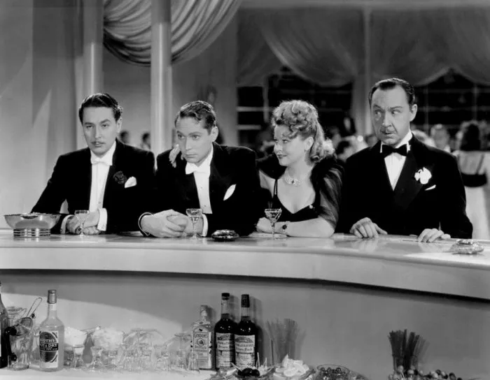 Reginald Gardiner (Willie), Barbara Pepper (Woman at the Bar), Franklin Pangborn (Adolf Pumpfel), Franchot Tone (Paul Wagner) zdroj: imdb.com