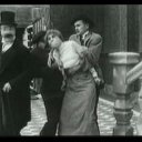 Chaplin bankovním sluhou (1915) - Stenographer
