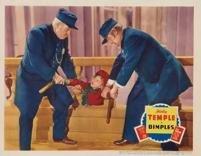 Shirley Temple (Dimples Appleby), Herbert Ashley (Policeman at Theater), A.S. ’Pop’ Byron (Policeman at Theater) zdroj: imdb.com
