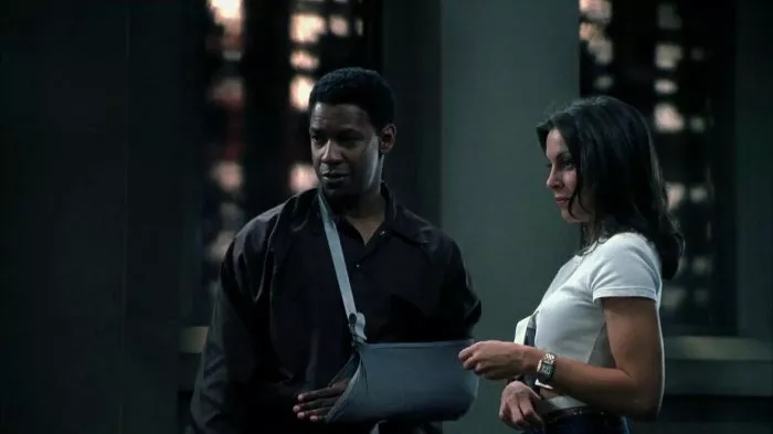 Denzel Washington (John Quincy Archibald), Heather Wahlquist (Julie Bird) zdroj: imdb.com