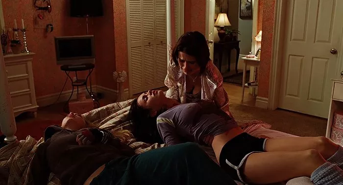 Amanda Seyfried (Needy), Megan Fox (Jennifer), Carrie Genzel (Mrs. Check)